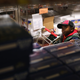 A child accompanies his grandmother choosing free groceries at a food pantry run by the Food Bank for New York City on Dec. 11, 2013, in New York City. (John Moore/Getty Images)